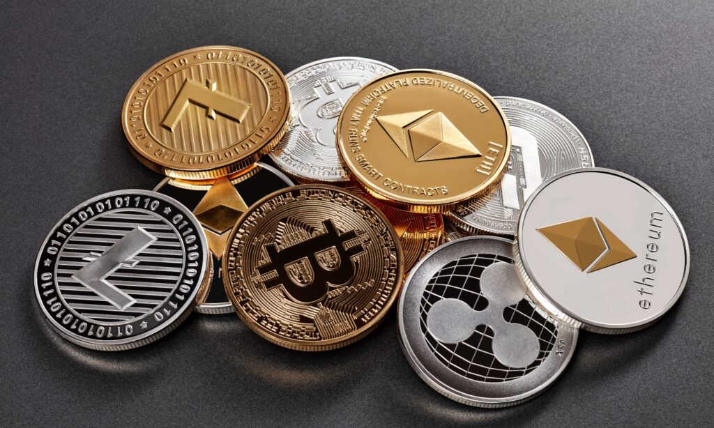 O que é Criptomoeda? Entenda o Futuro das Finanças Digitais Imagem que representa diversas criptomoedas, incluindo Bitcoin, Ethereum, Ripple e Litecoin, simbolizando o futuro das finanças digitais. O que é Criptomoeda? Entenda o Futuro das Finanças Digitais